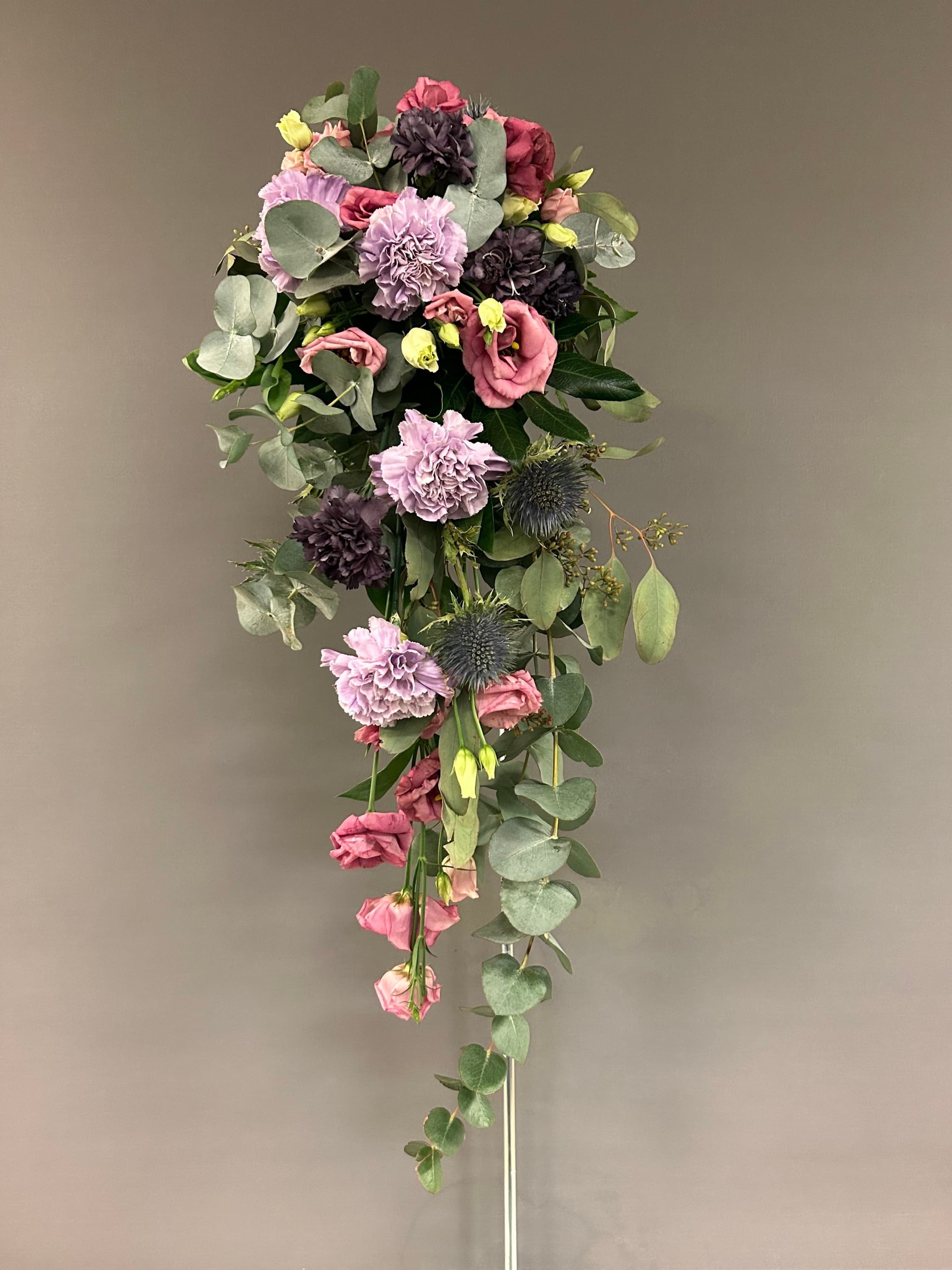 Colorful flower arrangement in white vase
